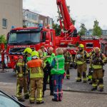 Grote brand in flat Vlaardingen: bewoners gered door brandweer via balkon en vluchtmaskers