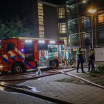 Woning in brand in Rozenburgse flat; opschaling naar middelbrand