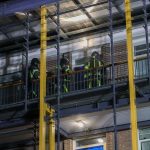 Woning in brand in Rozenburgse flat; opschaling naar middelbrand