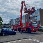 Grote brand in flat Vlaardingen: bewoners gered door brandweer via balkon en vluchtmaskers
